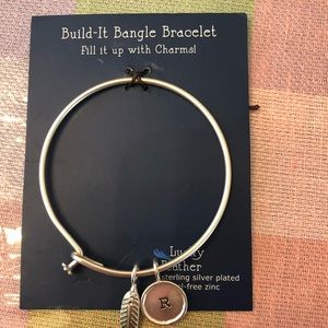 Build it up bracelet with R and feather